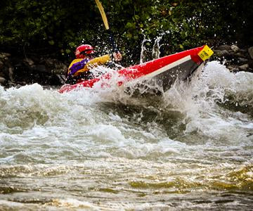  Man Shooting The Rapids In A Sotar 10' SL Inflatable Kayak 