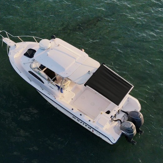 BocaShade Express Boat Shade black at the back of the boat