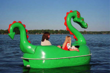 Load image into Gallery viewer, girls having fun riding the Adventure Glass Dragon Classic 2 Person Paddle Boat