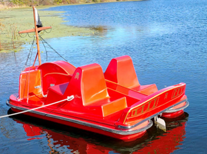 Adventure Glass Pirate Ship Platform Paddle Boat red at the lake