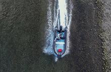 Load image into Gallery viewer, Swellfish FS Jet 400 XL Tunnel Foldable Inflatable Boat  passing on a very shallow water