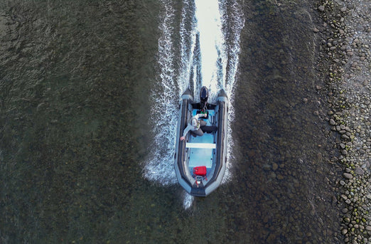 Man riding the Swellfish FS Jet 500 XL Tunnel Foldable Inflatable Boat 
