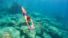 Load image into Gallery viewer, Man diving with the Sublue Navbow+ Underwater Scooter