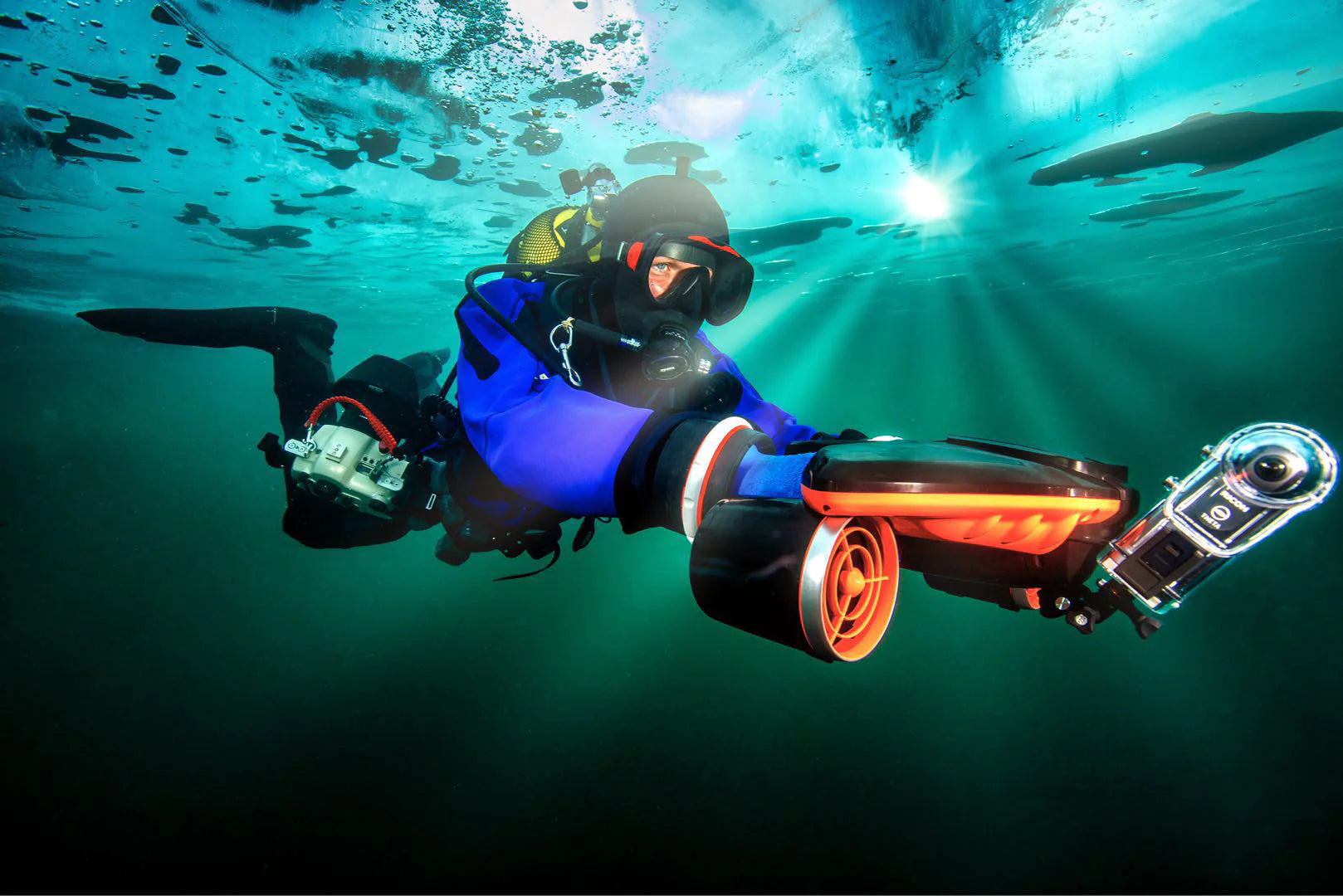Diver enjoying the view underwater with the Sublue Navbow Underwater Scooter