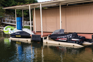 Connect-A-Port PWC Floating Dock XL6 Complete Kit attached to a fixed dock with jetskis docked