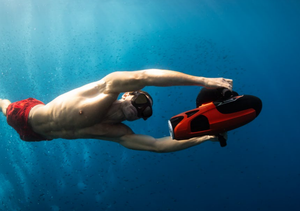 Man enjoying underwater with the Sublue Vapor Pump-Jet Underwater Scooter