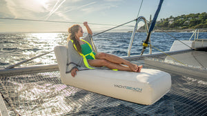 woman relaxing on the Yachtbeach Marine Leather Bench 1.60