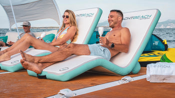 Man and woman having fun sitting on the Yachtbeach Sun Lounger Superior Single 29