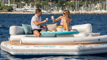 Load image into Gallery viewer, two people on board the Yachtbeach Pavilion  Party Setup