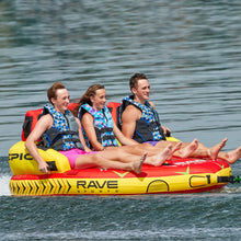 Load image into Gallery viewer, Rave #Epic 3P Towable Tube being towed with 3 people riding on it