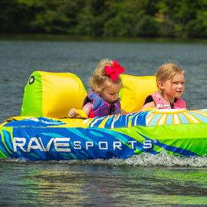 Rave Escape Pontoon 2P Towable Tube being towed with 2 kids riding on it