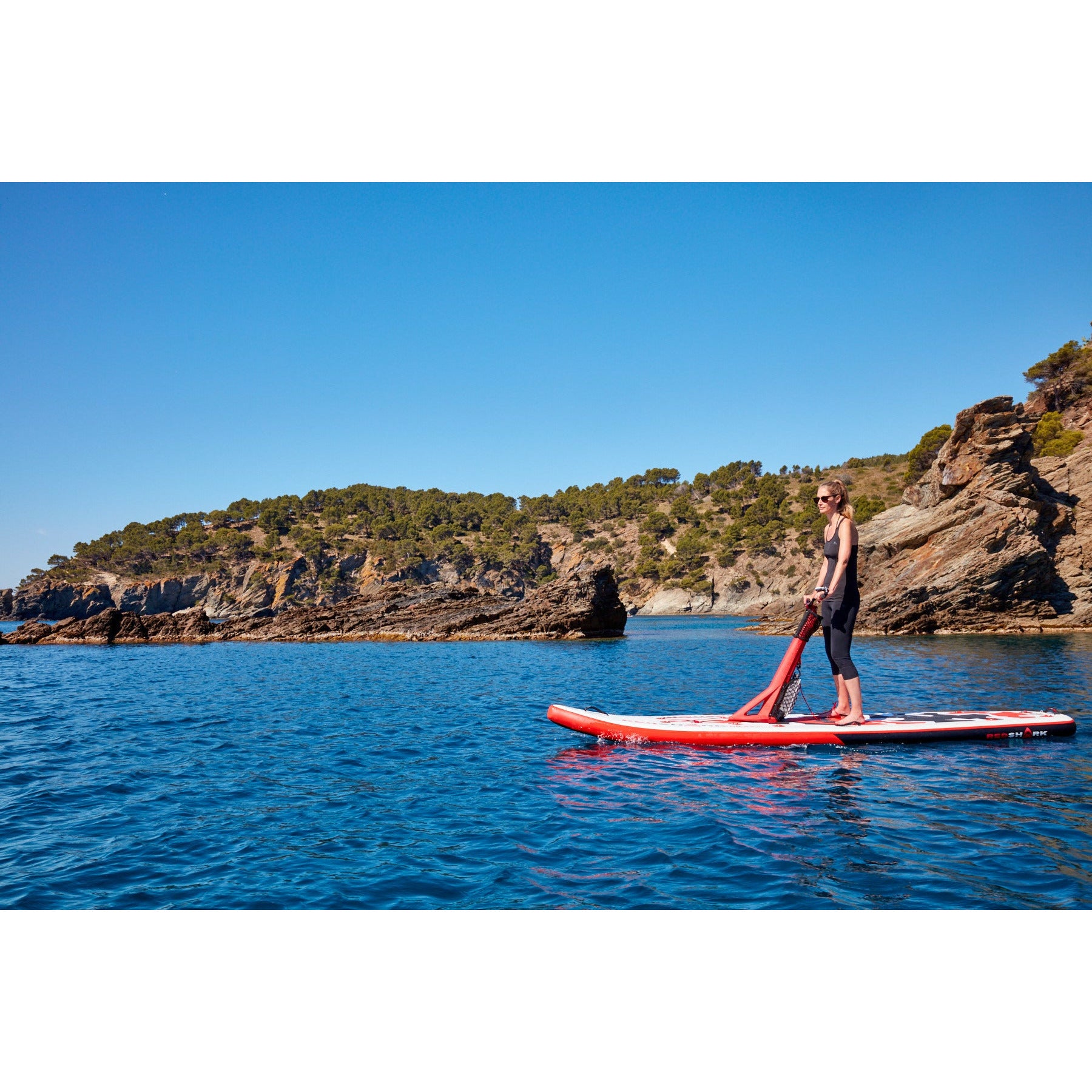 Red Shark Scooter Surf Water Scooter SUP with a woman on it