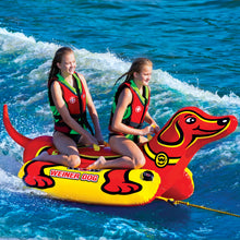 Load image into Gallery viewer, WOW Weiner Dog 2 Towable Tube being towed with 2 people riding it