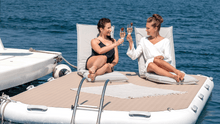Load image into Gallery viewer, Women having fun on the Yachbeach platform with the YachtBeach Boarding Ladder attached