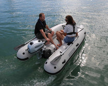 Load image into Gallery viewer, Man and woman riding the Takacat T300LX Inflatable Boat