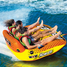 Load image into Gallery viewer, WOW Howler 3P Towable Tube being towed with 3 people riding it