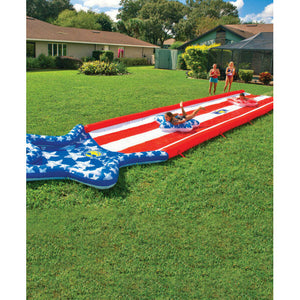WOW Americana Stars & Stripes Inflatable Slide with 2 kids sliding on it 