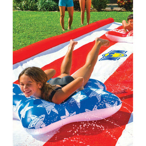 WOW Americana Stars & Stripes Inflatable Slide with 2 kids sliding on it