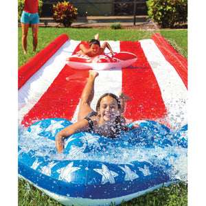 WOW Americana Stars & Stripes Inflatable Slide  with two kids slding on it