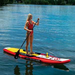 WOW-SOUND SUP Inflatable Paddleboard with bluetooth speaker with a girl on it