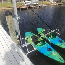 Load image into Gallery viewer, Kayak Dock Accessories - Seahorse Docking Floating Boarding Ladder with the seahorse docking kayak launch and stow  attached to a dock post