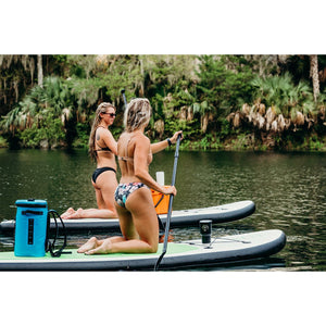 Inflatable stand up paddleboard - Woman paddling with the Eco Outfitters Inflatable Stand Up Paddle Board 10'6 