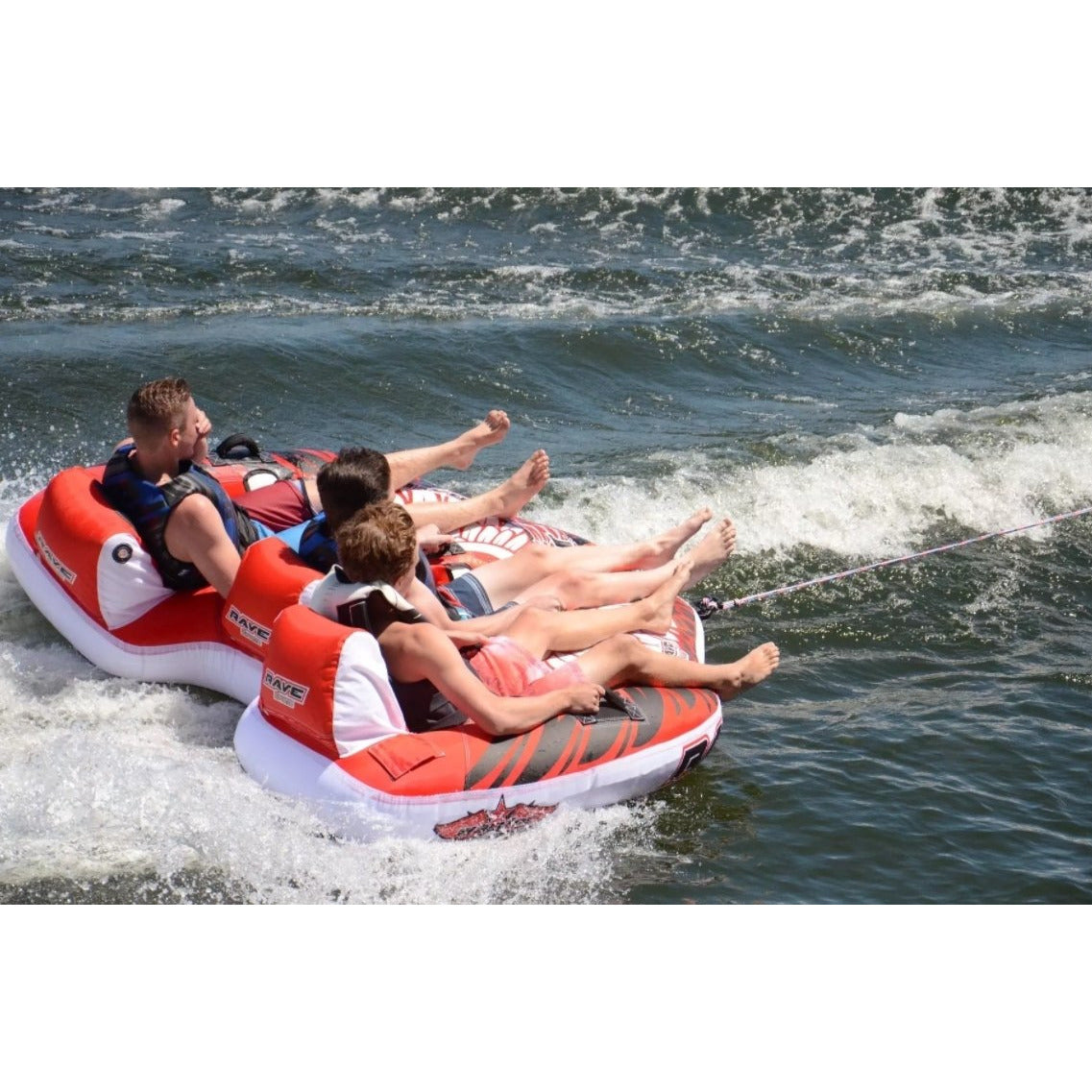 3 men riding Rave Sports Warrior III - 3 Rider Towable 02379