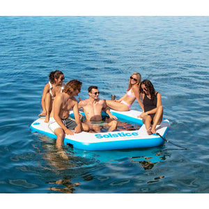 Group of friends enjoying on the Solstice Watersports 8’6” Inflatable Hex Mesh Dock