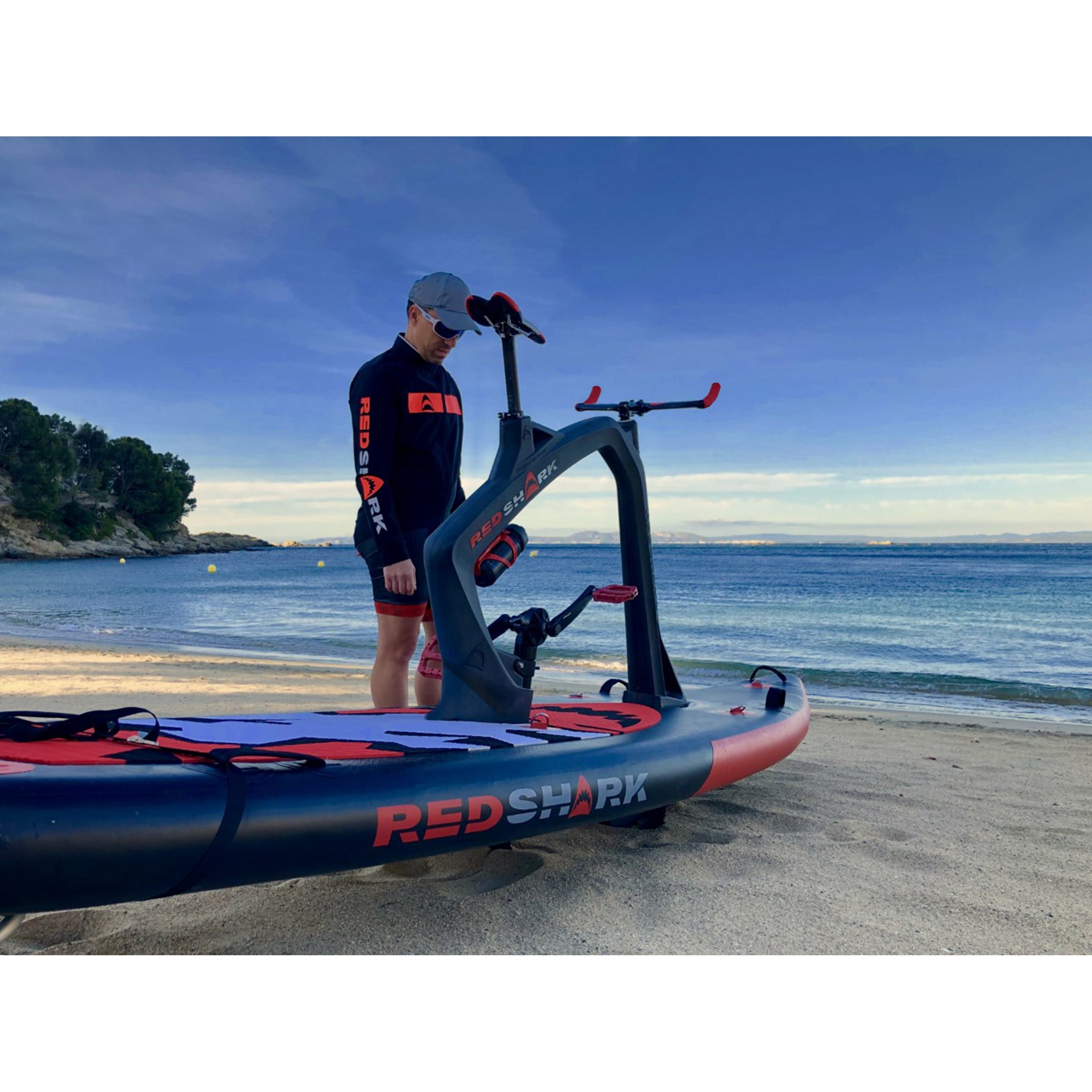 A Man With Red Shark Fitness Bike
