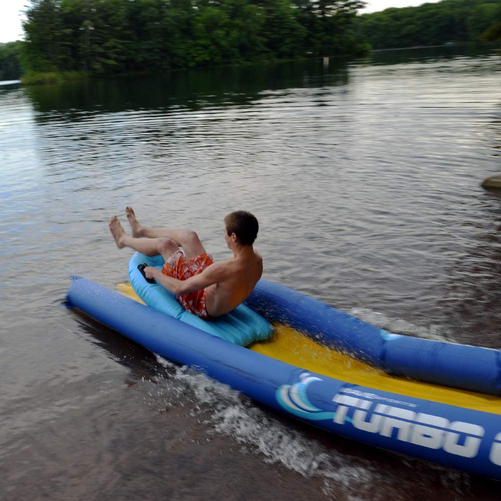 A kid riding at the Turbo Sled while sliding in the Rave 20' Turbo Chute Waterslide 