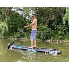 Load image into Gallery viewer, Stand Up Paddle Board - Man paddling with the Hurley PhantomTour 10&#39;6&quot; Inflatable Stand Up Paddle Board 