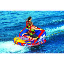 Load image into Gallery viewer, WOW Beach Bubba 2P Towable Tube being towed with 2 people