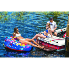 Load image into Gallery viewer, WOW Paradise 2P Soft Top Deck Towable Tube with 1 girl and 2 other people seating on a boat