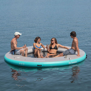 Platform - 4 people relaxing on  the Solstice Watersports Inflatable 8' X 8' X 8" Circular Mesh Dock 