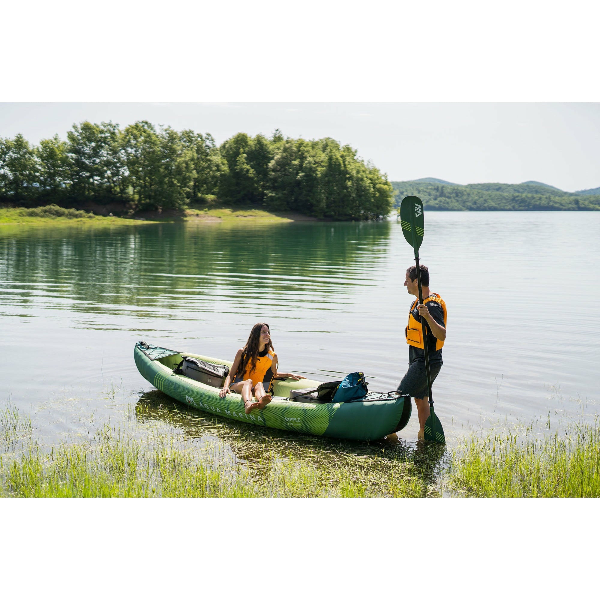 Inflatable Kayak - Man and Woman relaxing with the Aqua Marina Ripple 12'2" Recreational Inflatable Kayak RI-370 3-Person 2022