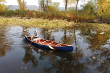 Load image into Gallery viewer, Man cruising with the Merrimack Canoes Sanborn + Merrimack Driftless Canoe