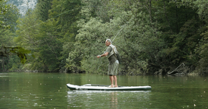 Man Fly Fishing On His SipaBoards Drive Fisherman 11' Electric Inflatable Paddleboard