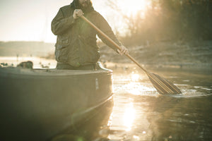 Man paddling with the Merrimack Canoes Gunflint Canoe Paddle 