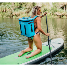 Load image into Gallery viewer, Inflatable stand up paddleboard - woman with an eco cooler boarding the Eco Outfitters Inflatable Stand Up Paddle Board 10&#39;6 green 