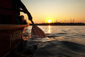Man paddling with the Merrimack Canoes Minnesota Canoe Paddle