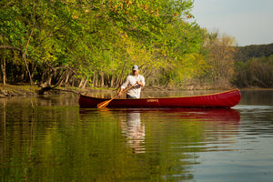 Man paddling with the Merrimack Canoes Nessmuk Canoe Paddle