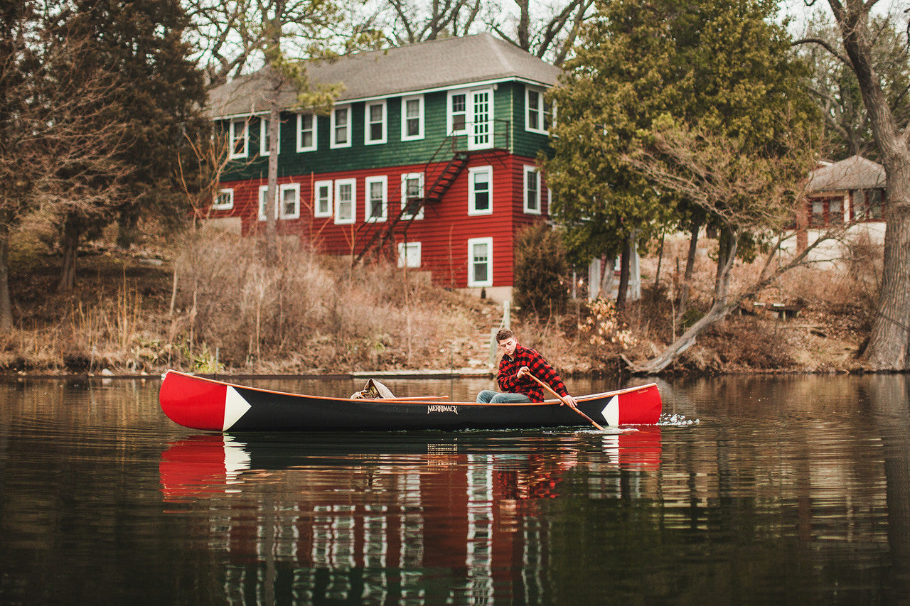 Man riding the Merrimack Canoes Sanborn + Merrimack Pickwick Canoe