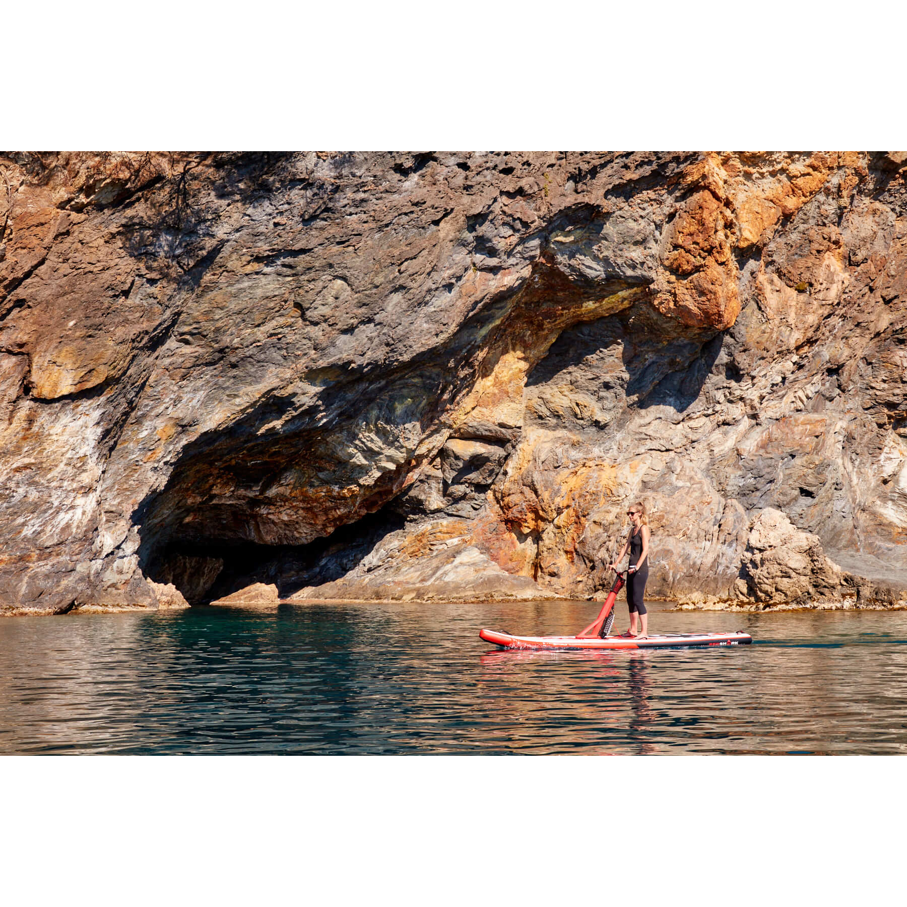 Red Shark Scooter Surf Water Scooter SUP with a woman on it