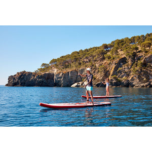 2 People Riding The Redshark Multi Water Sports Board Inflatable SUP With Paddle Kit