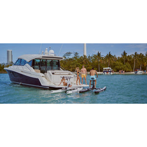 People relaxing with the Schiller Bikes S1-C Water Bike behind the boat