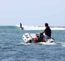 Load image into Gallery viewer, man cruising with the Takacat T380LX Inflatable Boat