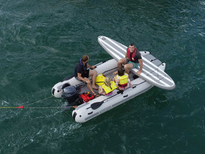 four people on board the Takacat T380LX Inflatable Boat