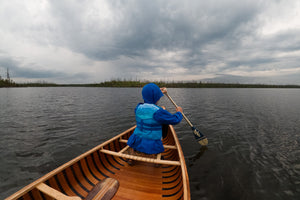Man riding the Merrimack Canoes Tennessean 14'6" Canoe