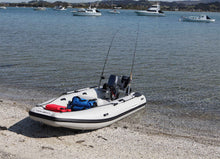 Load image into Gallery viewer, Takacat T260S Inflatable Boat stand by on the shore
