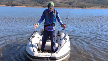 Man standing on the Takacat T260S Inflatable Boat